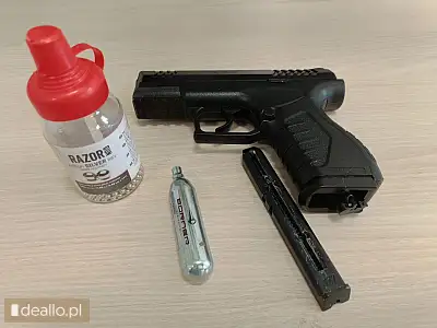 [eLicytacje] II licytacja - pistolet pneumatyczny firmy XBG kaliber 4,5 mm koloru czarnego, zasobnik - POZNANIAK.NET